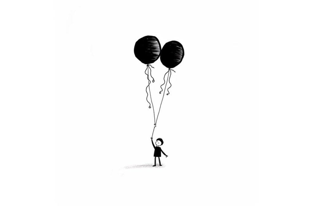 boy with two balloons